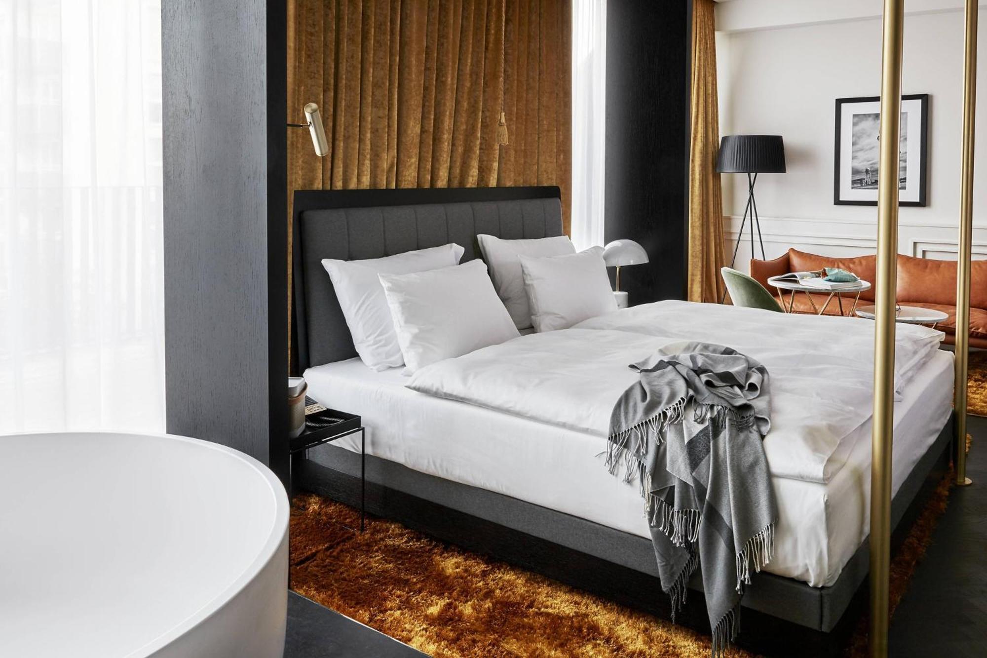 Roomers Munich, Autograph Collection Exterior foto A bedroom at the Hotel